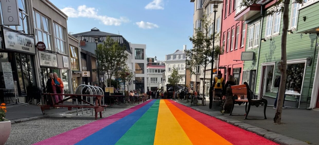 Prismo road marking product demonstration in a vibrant rainbow street