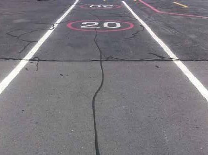 Crack sealing with Prismo Multiseal 40 on airport taxiway using skid resistant joint and crack sealant