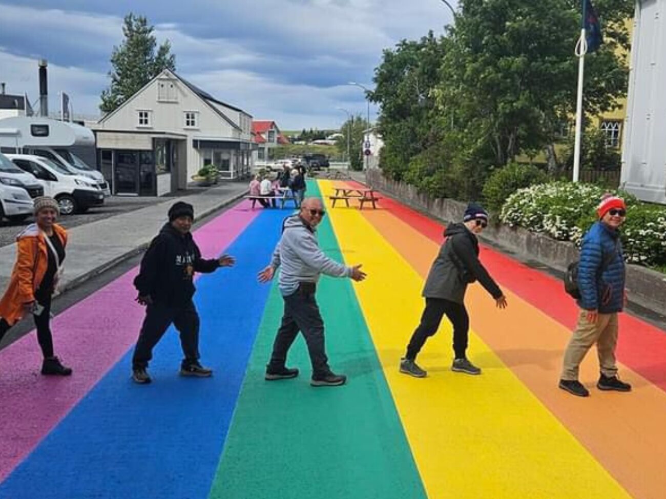 Prismo MMA Vernisol Robur Grip Rainbow Street markings with pedestrians in Husavik, Iceland