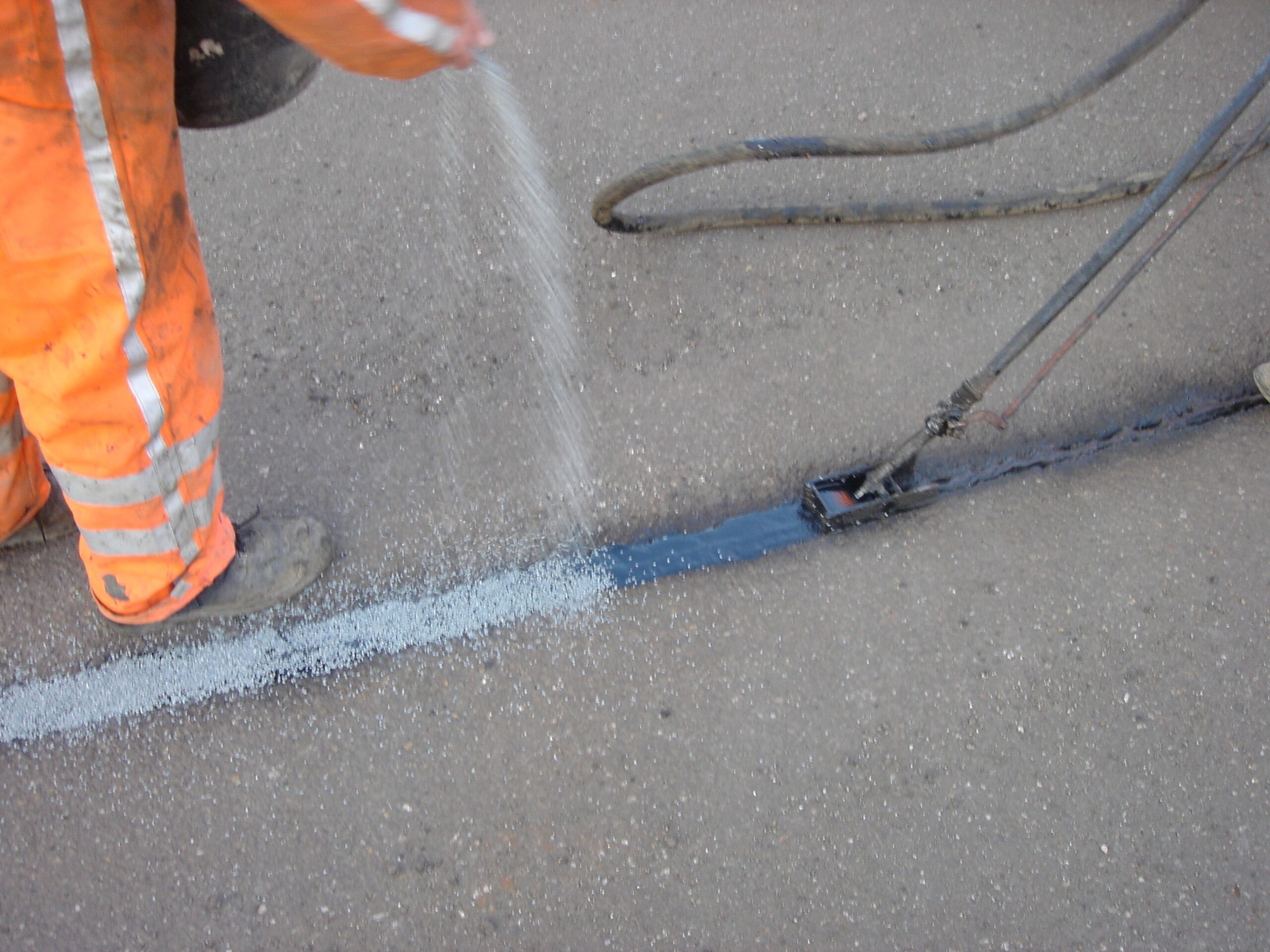 Prismoseal joint and crack sealant applied on concrete with anti-skid surface dressing in Rotterdam