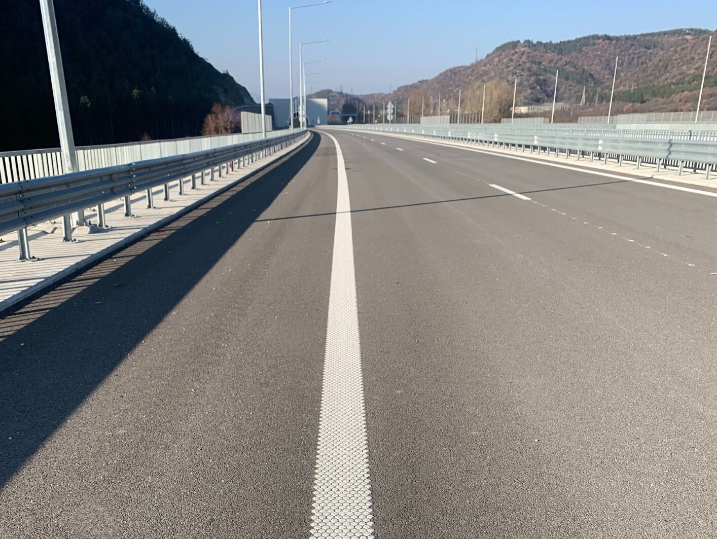 Prismo® Multidot hot applied thermoplastic applied as thin white line on highway in Bulgaria.