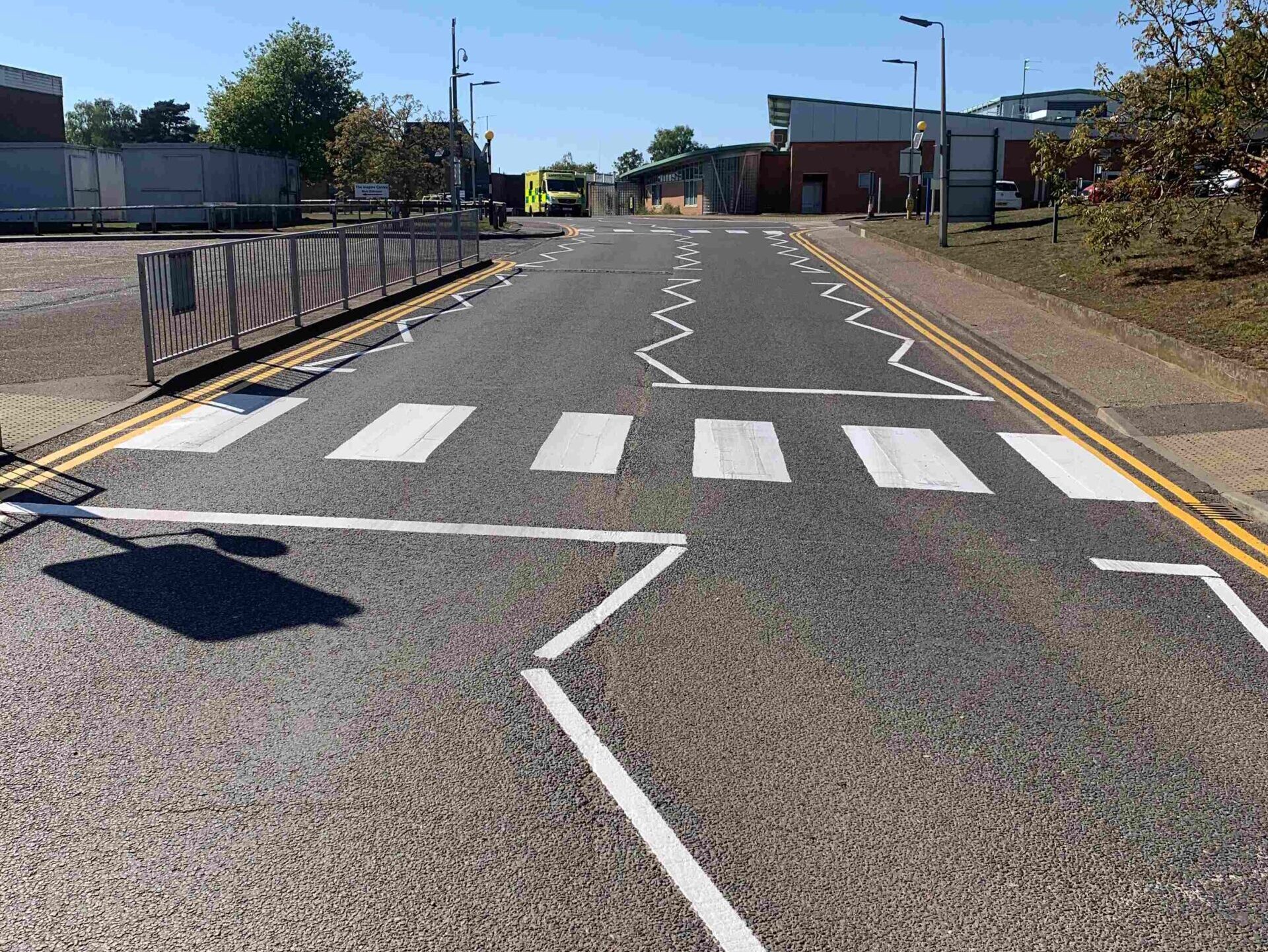 Prismo® Lifeline® shown as white pedestrian crossing and road markings on road surface.