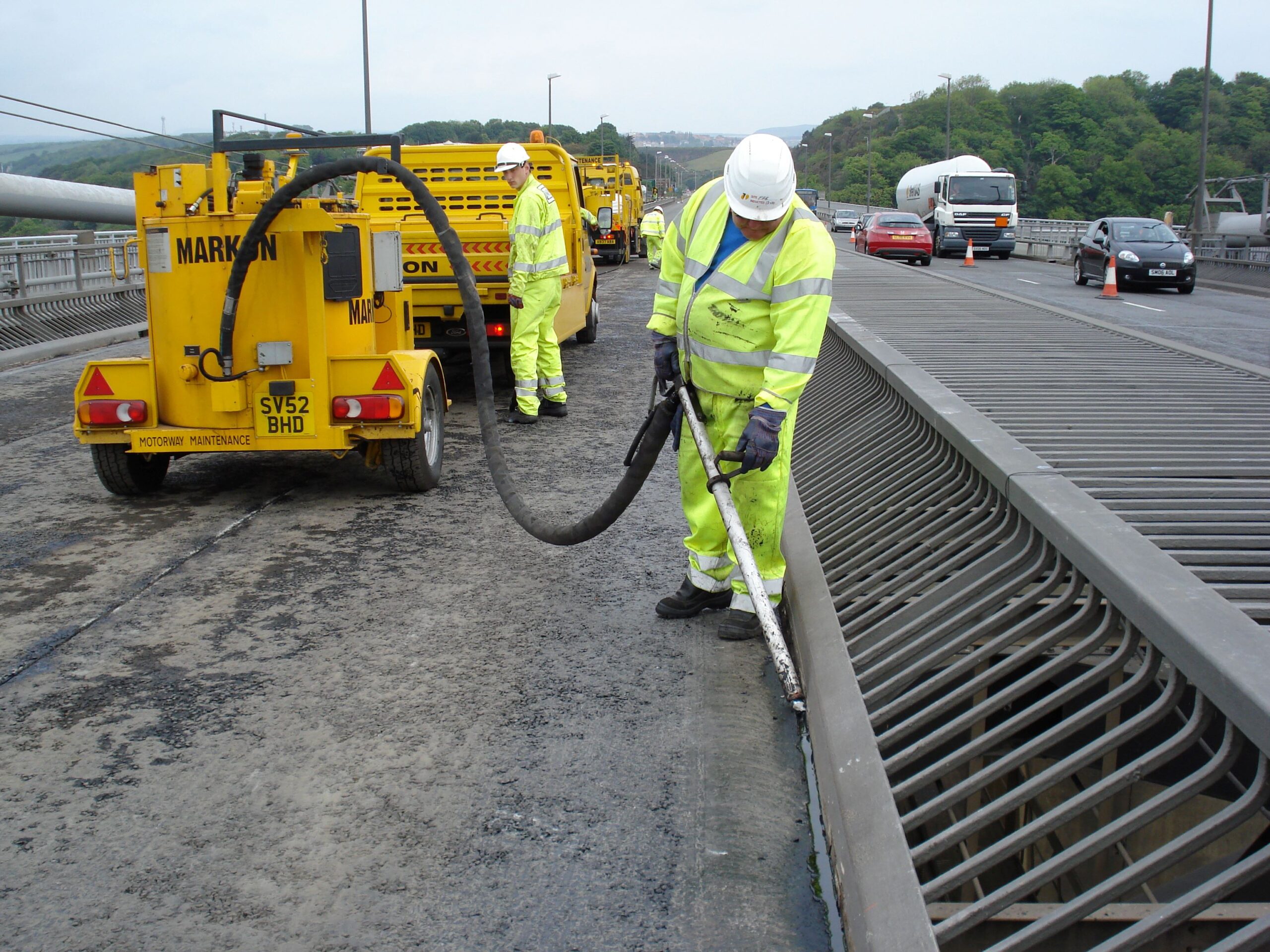 Bridge joint sealing with Multiseal 40 skid resistant crack repair product by Prismo on Scottish motorway bridge