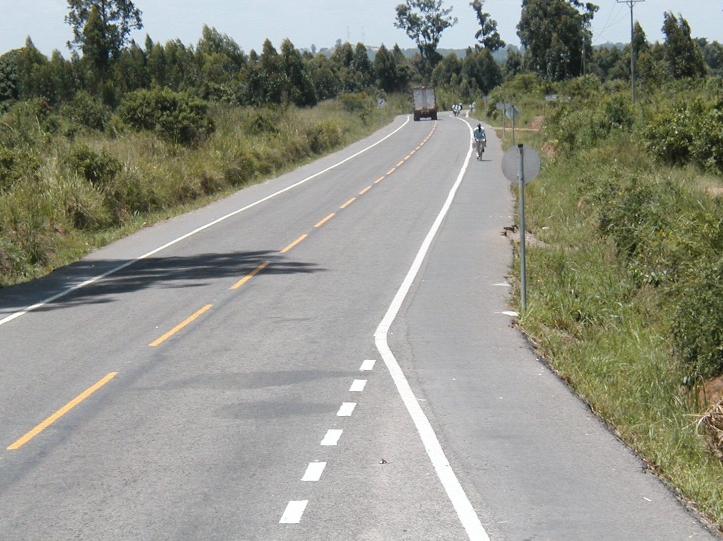 Prismo® Crystalex® hot applied thermoplastic applied on road surface in Uganda as white and yellow lines.