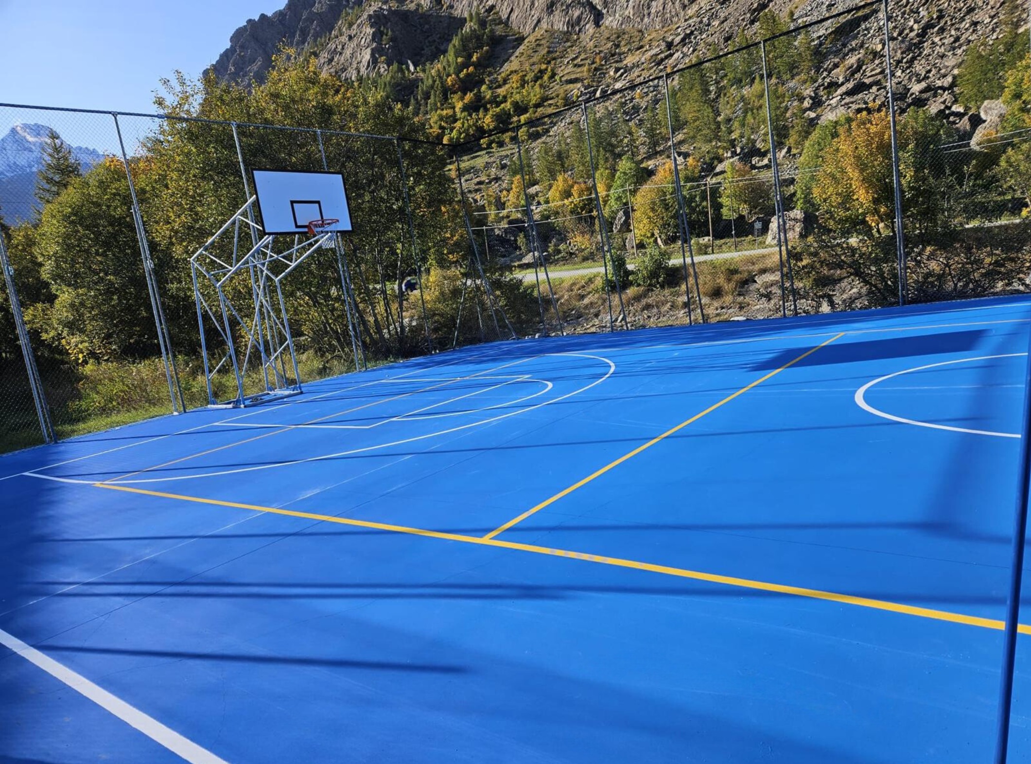 `Prismo Vernisol Verace Blue 5015 applied on a basketball court sports ground near Turin, Italy