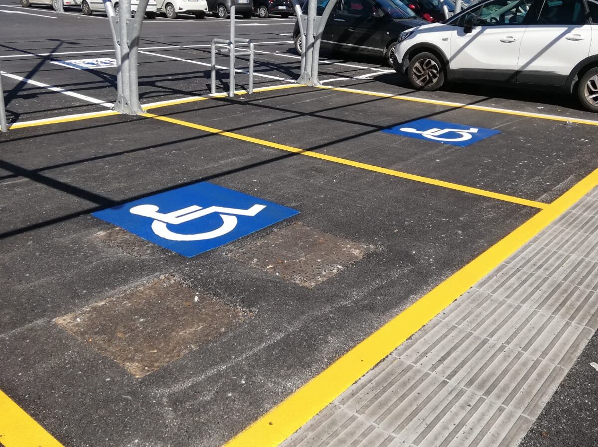 Prismo preformed thermoplastic disabled bay markings in a car park, Caserta, Italy