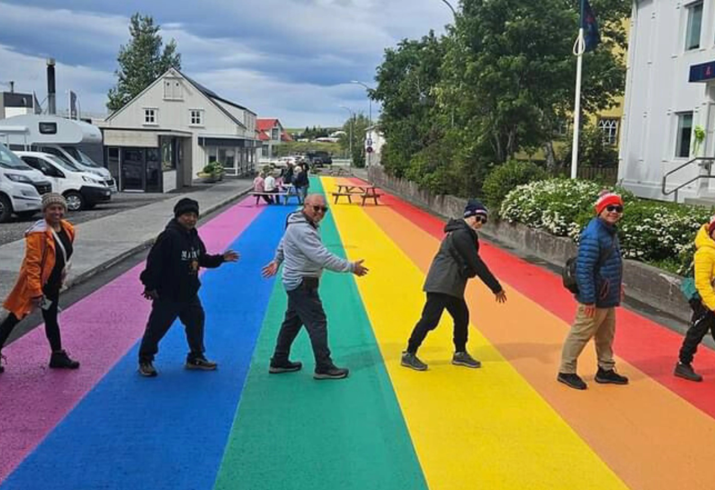 The Prismo team crossing a road