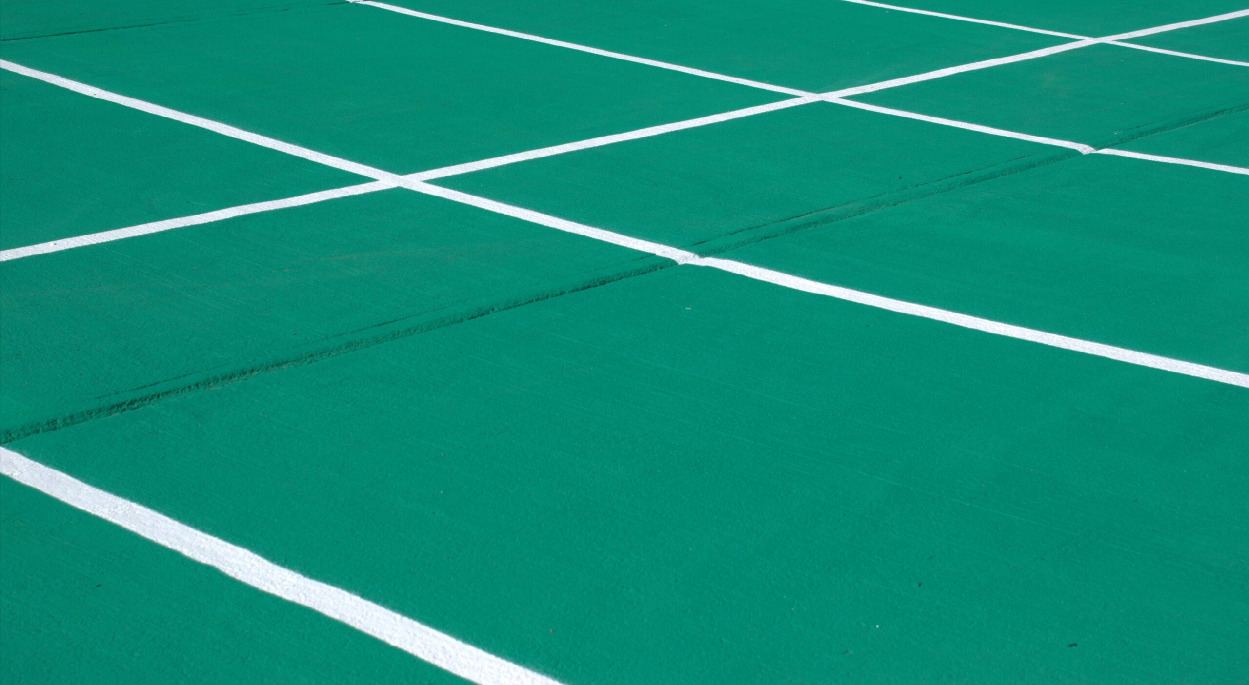Prismo Epoxyline solvent based acrylic paint applied for car park markings.