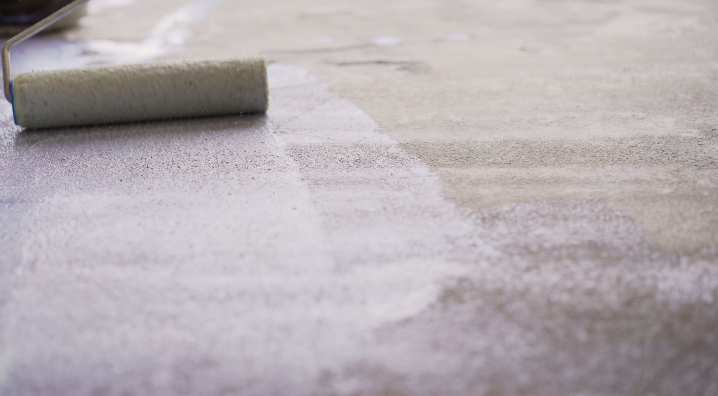 Universal Primer Sealer being applied with roller for area markings