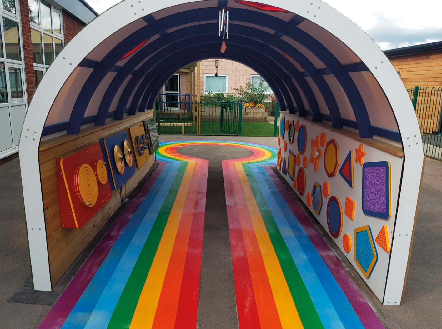 Preformed thermoplastic multicoloured playground design in a school playground